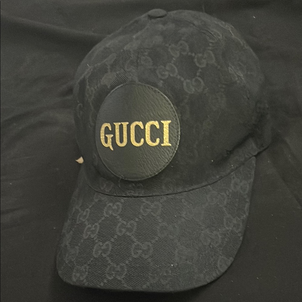 Gucci Black Cap with Gold Lettering
